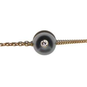 PARISIAN MONOÏ    Bracelet or, perle de Tahiti et diamant