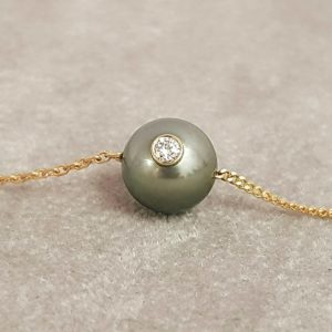parisian monoï JDL Paris diamant dans perle de tahiti